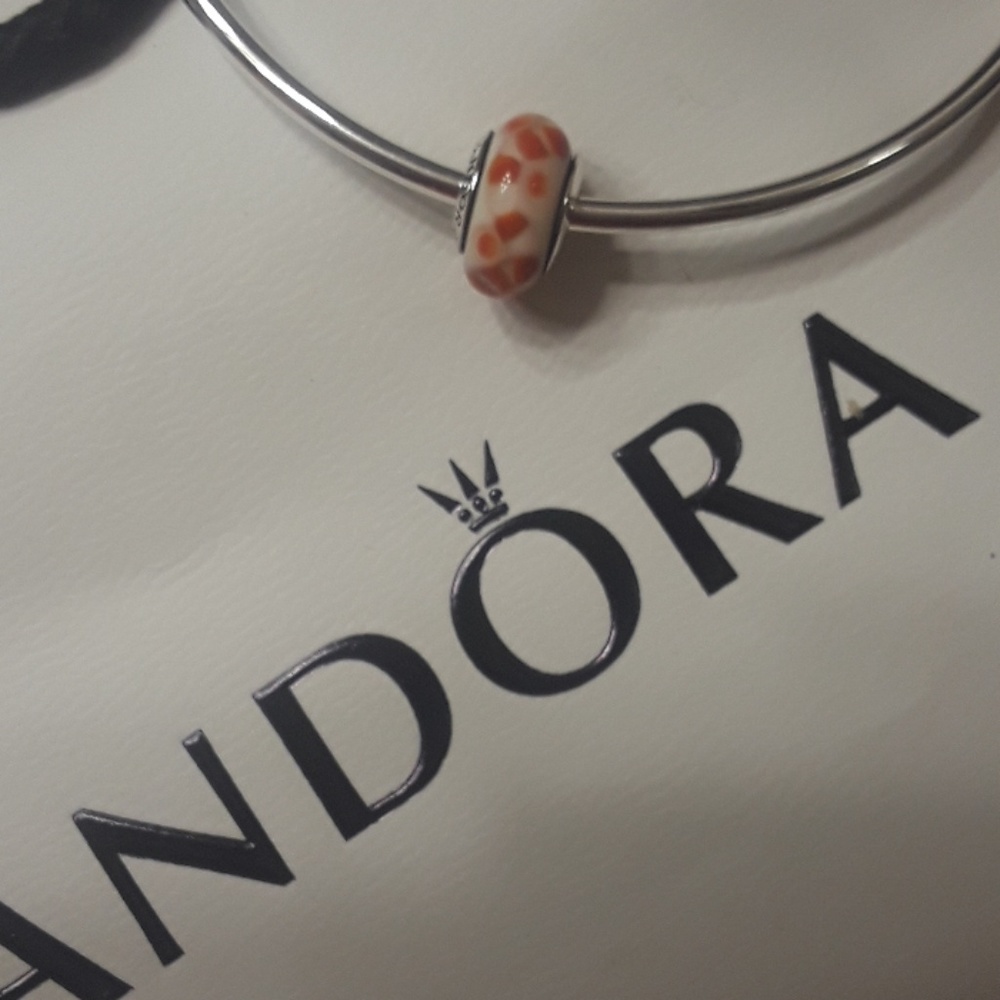 Orange and white pandora murano